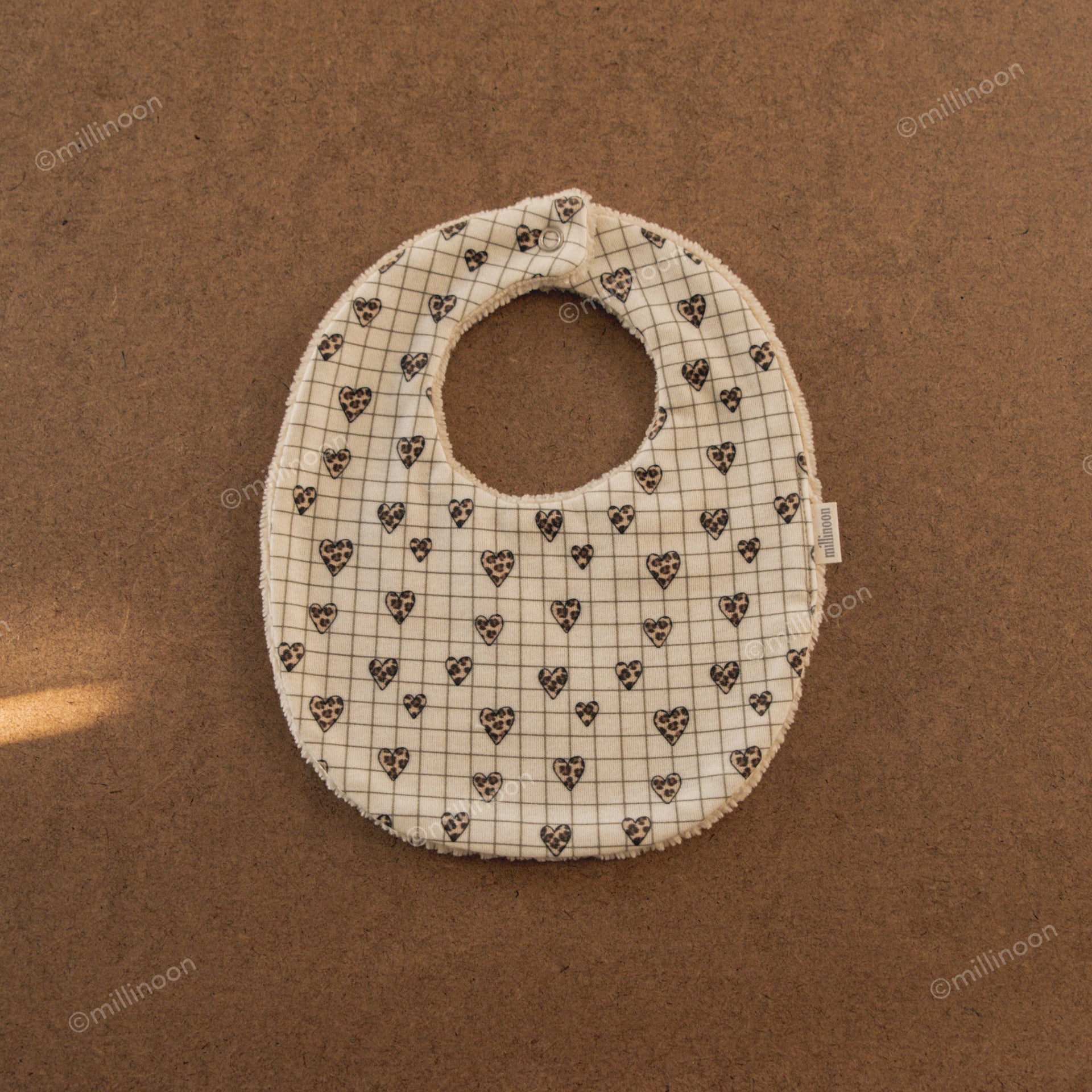 Bavoir maille coton bio carreau coeur graou
