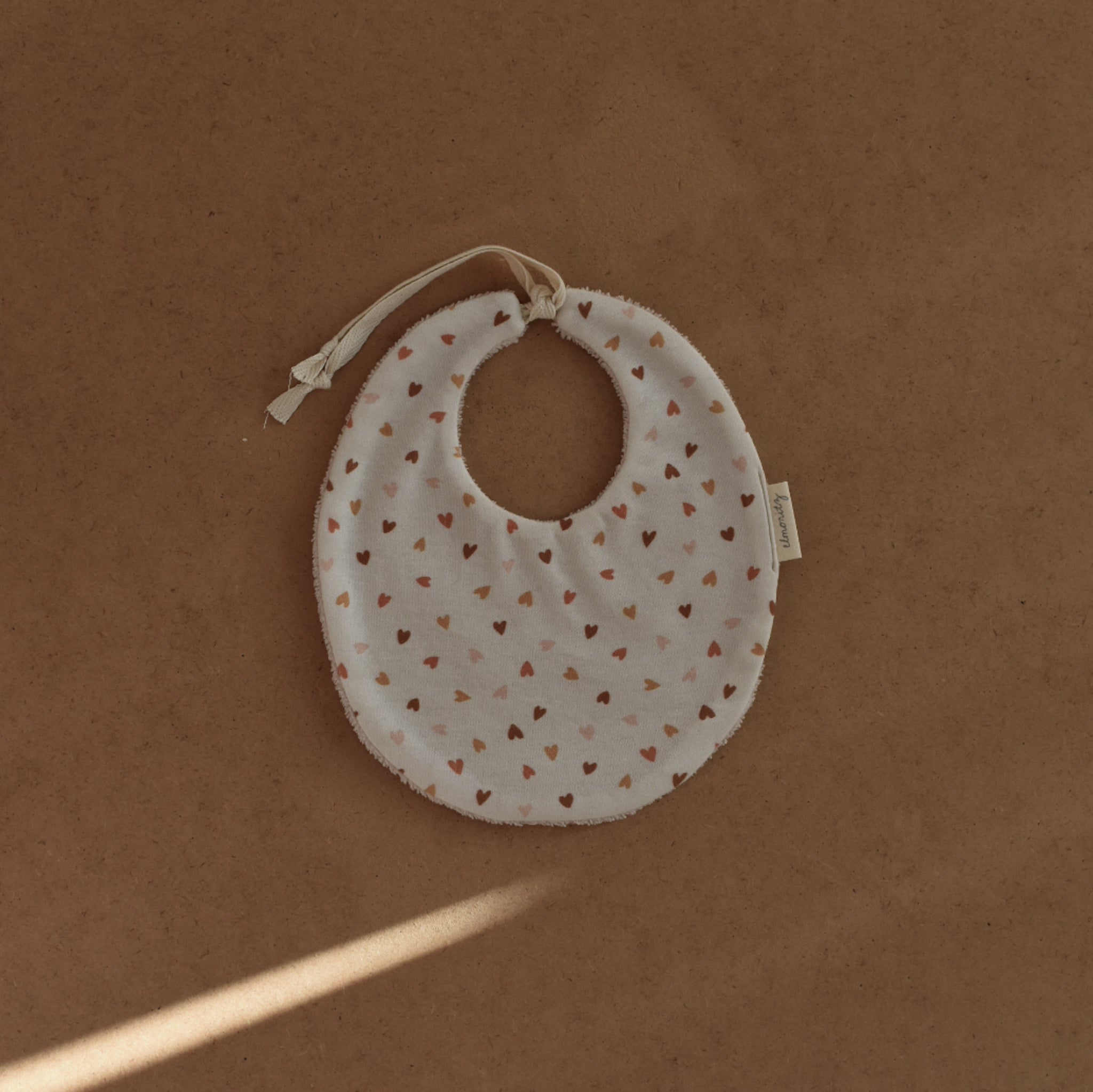 Bavoir maille de coton bio Coeur